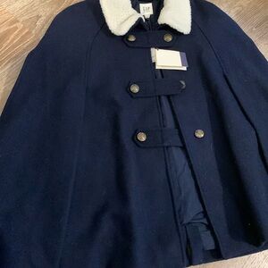 Never worn tags still on , navy blue pea coat